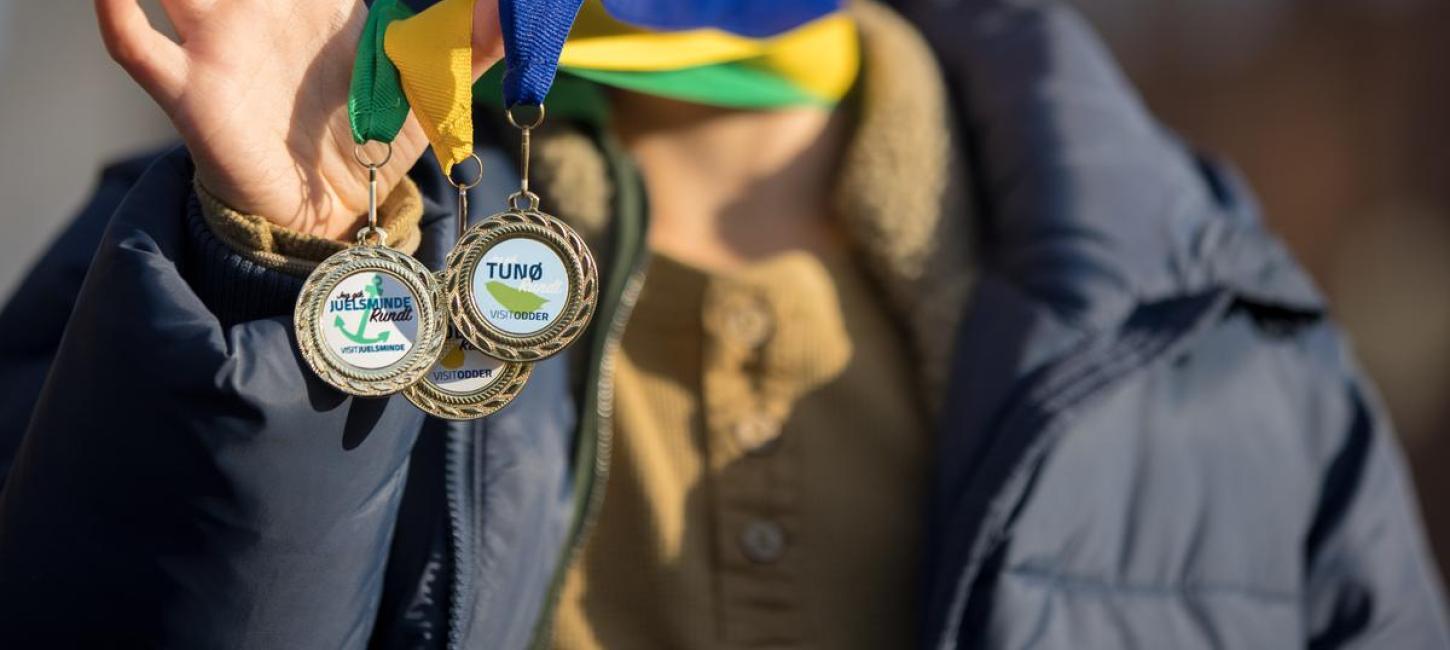 Begeben Sie sich auf die Schatzsuche und finden Sie die Antworten – und gewinnen Sie eine Medaille für die Kleinsten.