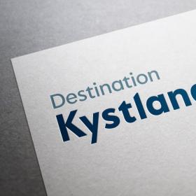 Brevhoved med Destination Kystlandet logo